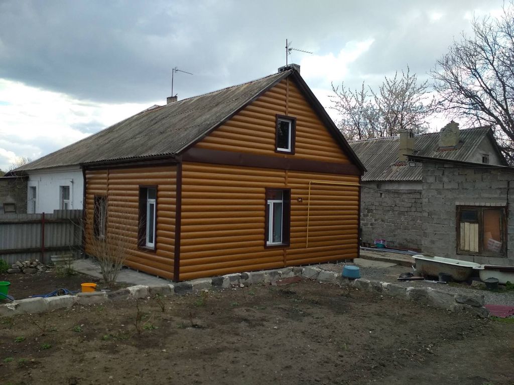 Металлосайдинг под дерево Блок-Хаус металлический, цена в Донецке от  компании СТРОЙОПТТОРГ